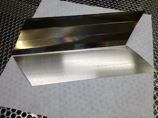 Roller-embossing shims, front- and backside